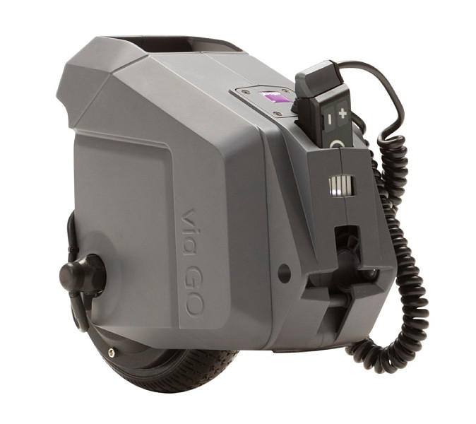 wheelchair power assist device attached to manual wheelchair