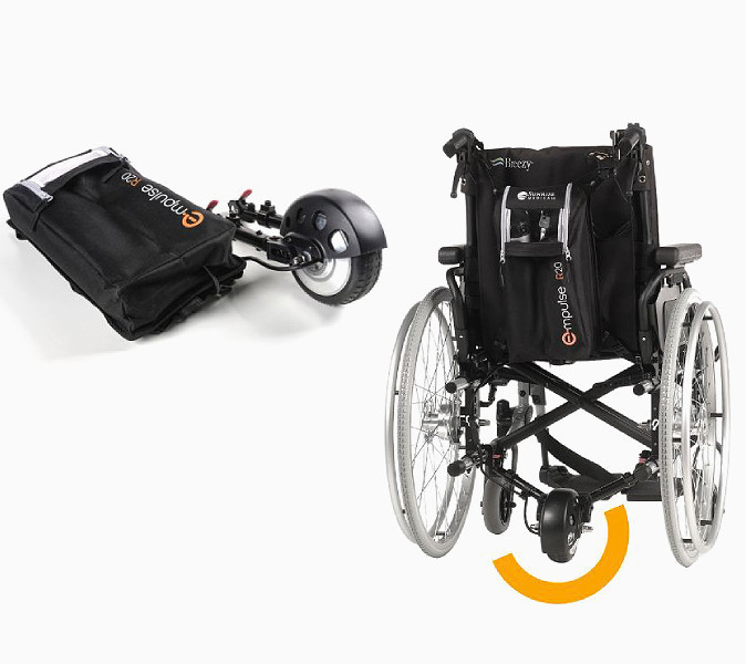 helping someone in wheelchair outdoors on sidewalk